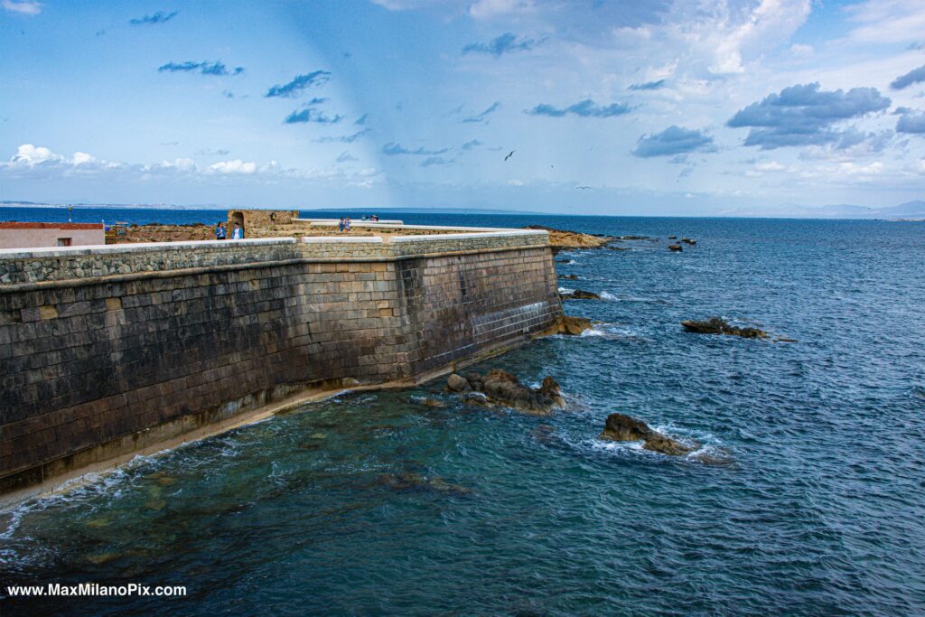 The stone sea wall of Tabarca Island, Alicante